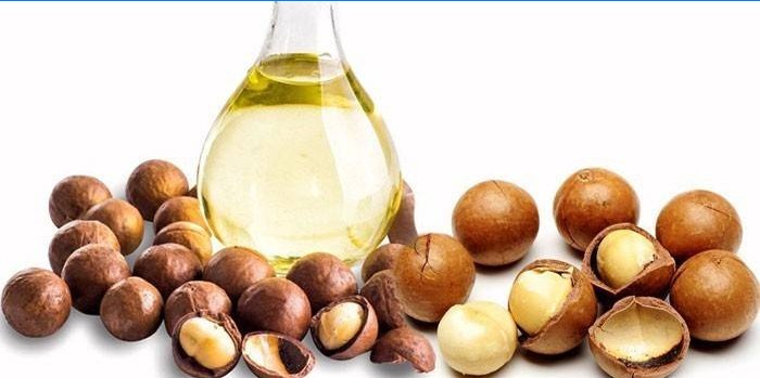 Olio di macadamia in barattolo e noci