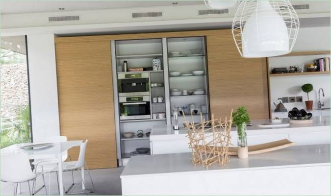 Pietra e cemento: la cucina in bianco e beige