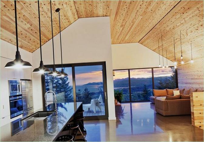 Design della casa in legno del Quebec: interni della cucina-sala da pranzo
