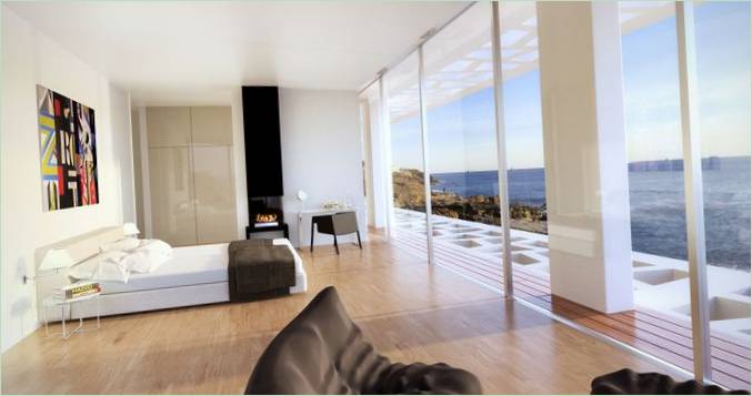Ampia camera da letto principale con camino e vista panoramica sul mare