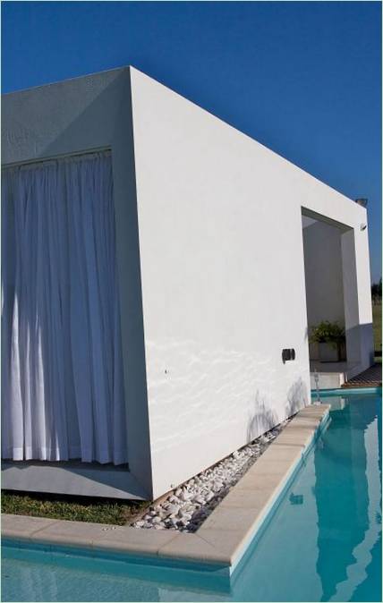 Cottage DT Puerto Roldán di VismaraCorsi Arquitectos