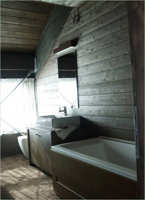 Design degli interni del cottage Camelot 2 nelle montagne italiane